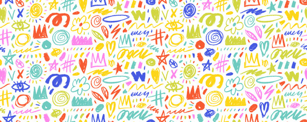 Colorful funky kid's seamless pattern with crayon drawn cute elements.