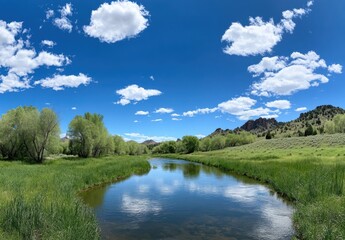 Fototapeta premium Serene river flowing through lush greenery under a vibrant sky