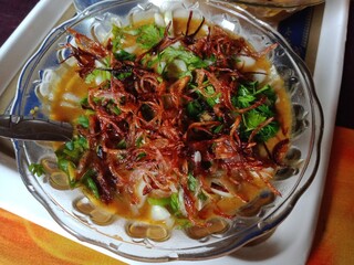 Bangladeshi traditional shahi haleem with ingredients rice flour,  various seeds flour, spices,...