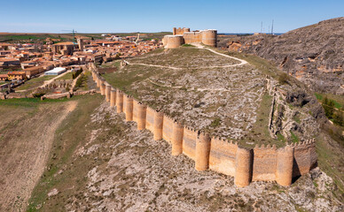 Drone photo of Berlanga de Duero's castle and town. Restored remains of medieval stronghold.