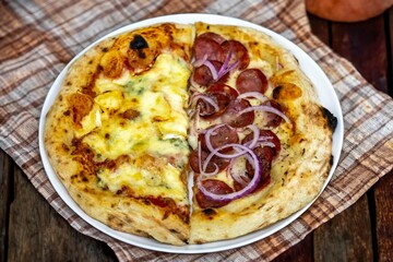 The most authentic Brazilian pizza, half pepperoni, onion and half four cheeses