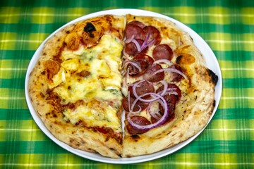 The most authentic Brazilian pizza, half pepperoni, onion and half four cheeses