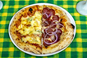 The most authentic Brazilian pizza, half pepperoni, onion and half four cheeses