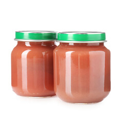 Baby food. Tasty puree in glass jars isolated on white