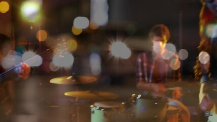 drummer performing on city street, streaming animated sound waves over drums for technology