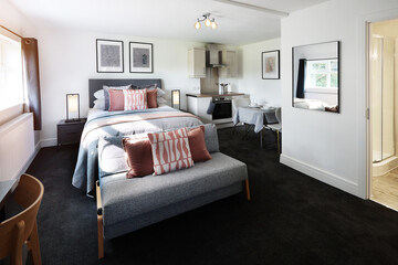 Hotel, interior and room at luxury accommodation for travel, vacation or holiday in England....