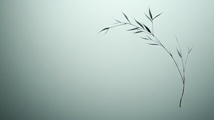 Elegant bamboo sprig against a muted backdrop.