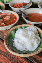 Rice vermicelli  with spicy pork sauce 