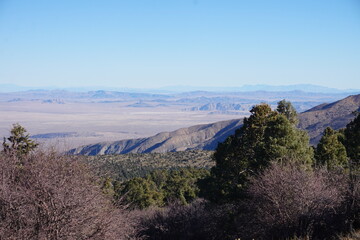 Expansive view from the San Bernardino Mountains looking out over the California desert, featuring...