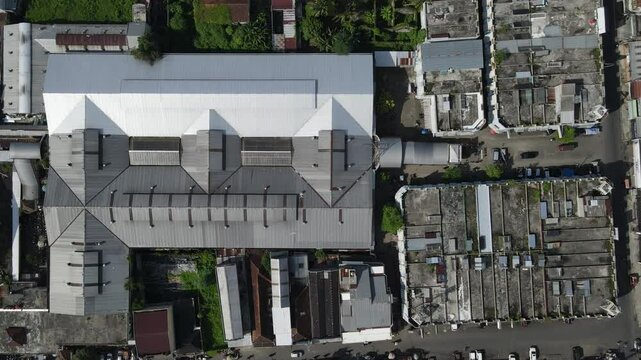 Aerial View of city buildings, market and dense population sub-district area in Southeast Asia. Architecture from above 