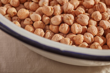 A bowl of dried chickpeas, ready for soaking and cooking