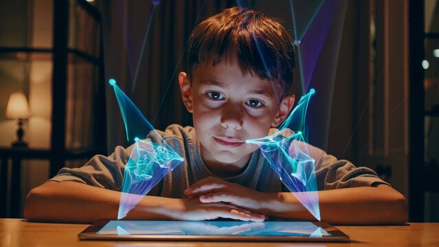 Young boy engaging with futuristic holographic augmented reality interface emerging from illuminated tablet during nighttime digital exploration, revealing cutting edge technological interaction - Powered by Adobe