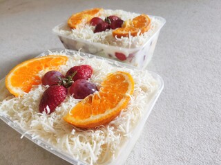 Refreshing fruit salads served in plastic container