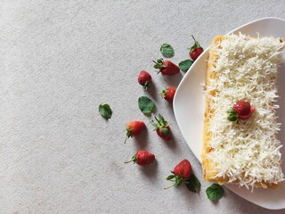 Steamed brownies with cheese and strawberry on top