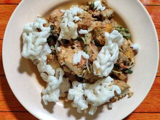 Rujak cingur is a traditional food typical of East Java, especially Surabaya, which is made from various fresh ingredients such as cingur meat (cow skin), vegetables and fruit sprinkled with Indonesia