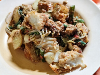 Rujak cingur is a traditional food typical of East Java, especially Surabaya, which is made from various fresh ingredients such as cingur meat (cow skin), vegetables and fruit sprinkled with Indonesia