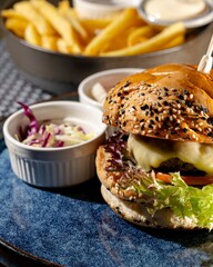 Delicious gourmet burger with crispy fries trendy bistro food photography inviting atmosphere close-up view culinary delight