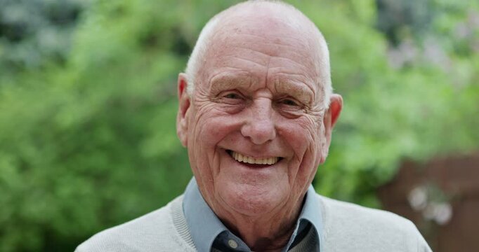 Senior man, face and happy in backyard for positive, pride and retirement with relax wellness in house. Mature person, smile and portrait of gratitude outdoor and satisfaction for calm in garden