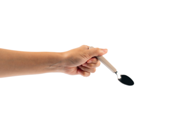 Hand and metal white spoon on transparent background.