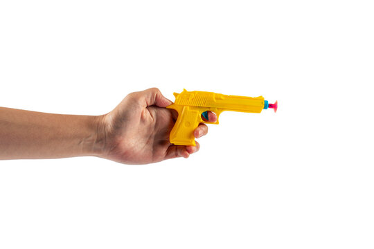 Plastic yellow toy gun shaped llike a real one on transparent background