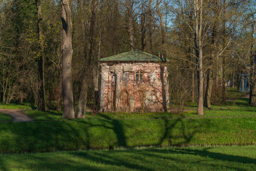 View of the kitchen-ruin pavilion in the Catherine Park of Tsarskoye Selo on a sunny spring day,...