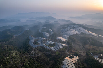 Obraz premium solar power on mountain with sunrise