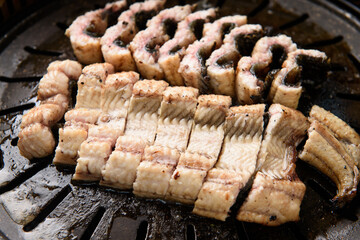 Grilling eel on the grill
