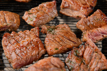 Grilling ribs on a brazier
