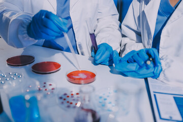 Researcher using a professional microscope