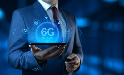 Businessman Holding Smartphone with 6G Network Icons on Screen. Business and Technology concept
