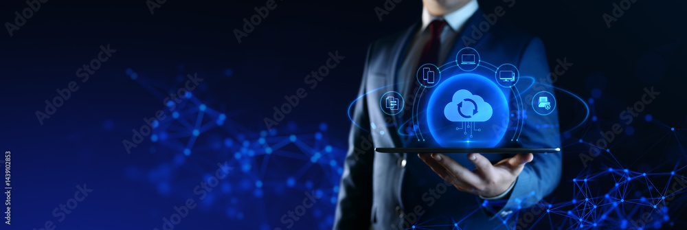 Poster businessman holding tablet with cloud computing icons on screen. data transfer and cloud backup tech