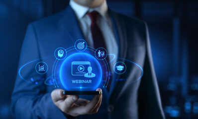 Businessman Holding Smartphone with Webinar Icons on Screen. E-learning and Education Concept