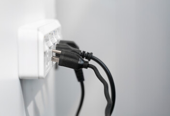 Plug in not fully into  electrical outlet