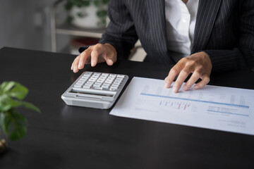 business man Auditor or internal revenue service staff checking annual financial statements company...