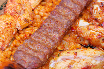 Turkish Traditional Sish Adana Urfa Kebab served with spiced rice 