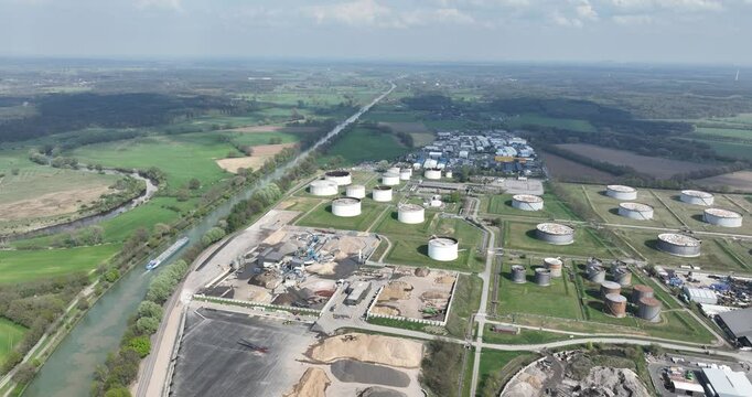 petroleum, gas, industrial storage silos, along the Wesel Datteln canal, Bucholtwelmen, Hunxe, Germany. Aerial view.