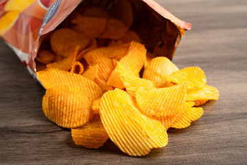 Potato chips delicious BBQ seasoning spicy for crips, thin slice deep fried snack fast food.