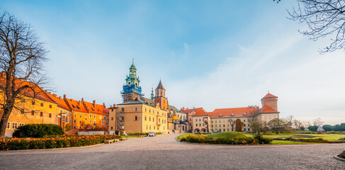 Wawel castle landmark with city view near river in Krakow Poland. Autumn landscape on coast river Wisla.