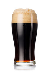 A tall glass of dark stout beer with frothy head, isolated on a clean white background