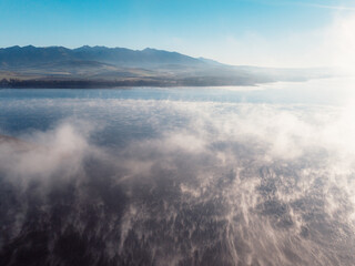 Sunset over Liptov region with and High Tatras mountains around. Liptovsky Mikulas landspace, slovakia.