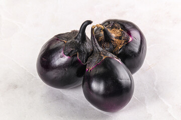 Raw violet and black eggplant