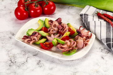 Salad with baby octopus and avocado