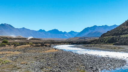 The Ahuriri braided river  flowing through the  Ahuriri conservation valley area  in Canterbury NZ