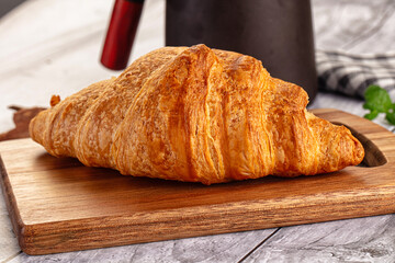 Fresh hot homemade croissant for breakfast