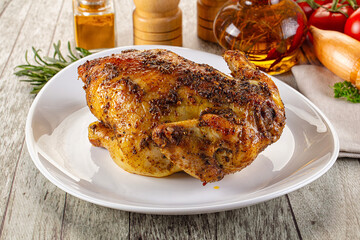 Baked in oven whole chicken with spices