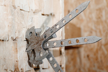 three metal axes in wooden block stand as target, throwing axes and knives, sports competition,...
