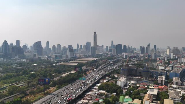 Aerial view of Bangkok cityscape and Sirat Expressway Traffic