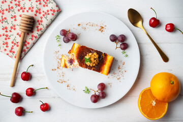Cheesecake with grapes. Top view table.