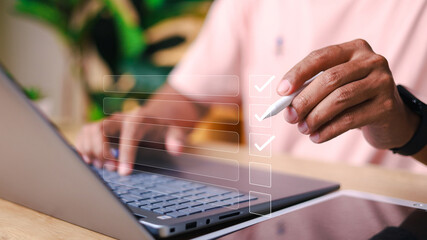 Digital Checklists for efficient business management, Businessman touching marking on checklist...