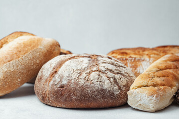 Freshly baked artisan bread displayed on a light surface